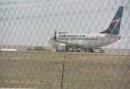 Cancellation of a WestJet flight departing to Calgary after an incident on Denver runway