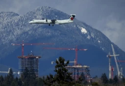 Passenger detained after assault on board an Air Canada Express plane